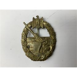 Three WW2 German badges comprising Blockade Runner War Badge and Coastal Artillery badge, both marked 'Fec Otto Placzec Berlin'; and Infantry Assault Badge; all with fixing pins (3)
