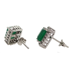 Pair of 18ct white gold emerald and diamond cluster stud earrings, hallmarked