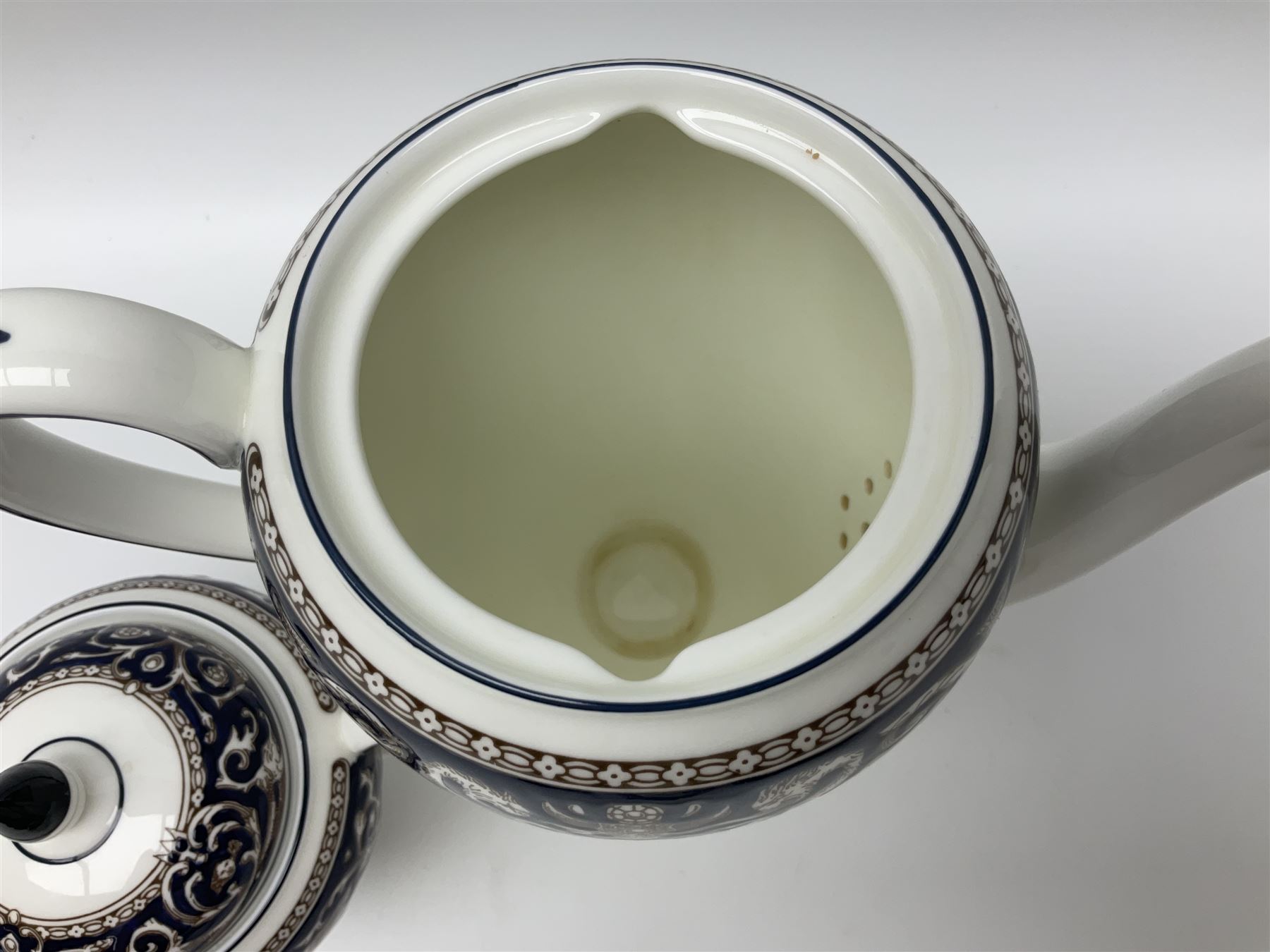 Wedgwood navy Florentine pattern coffee service for six, comprising coffeepot, coffee cans and saucers, milk jug, twin handled covered sucrier and small dish