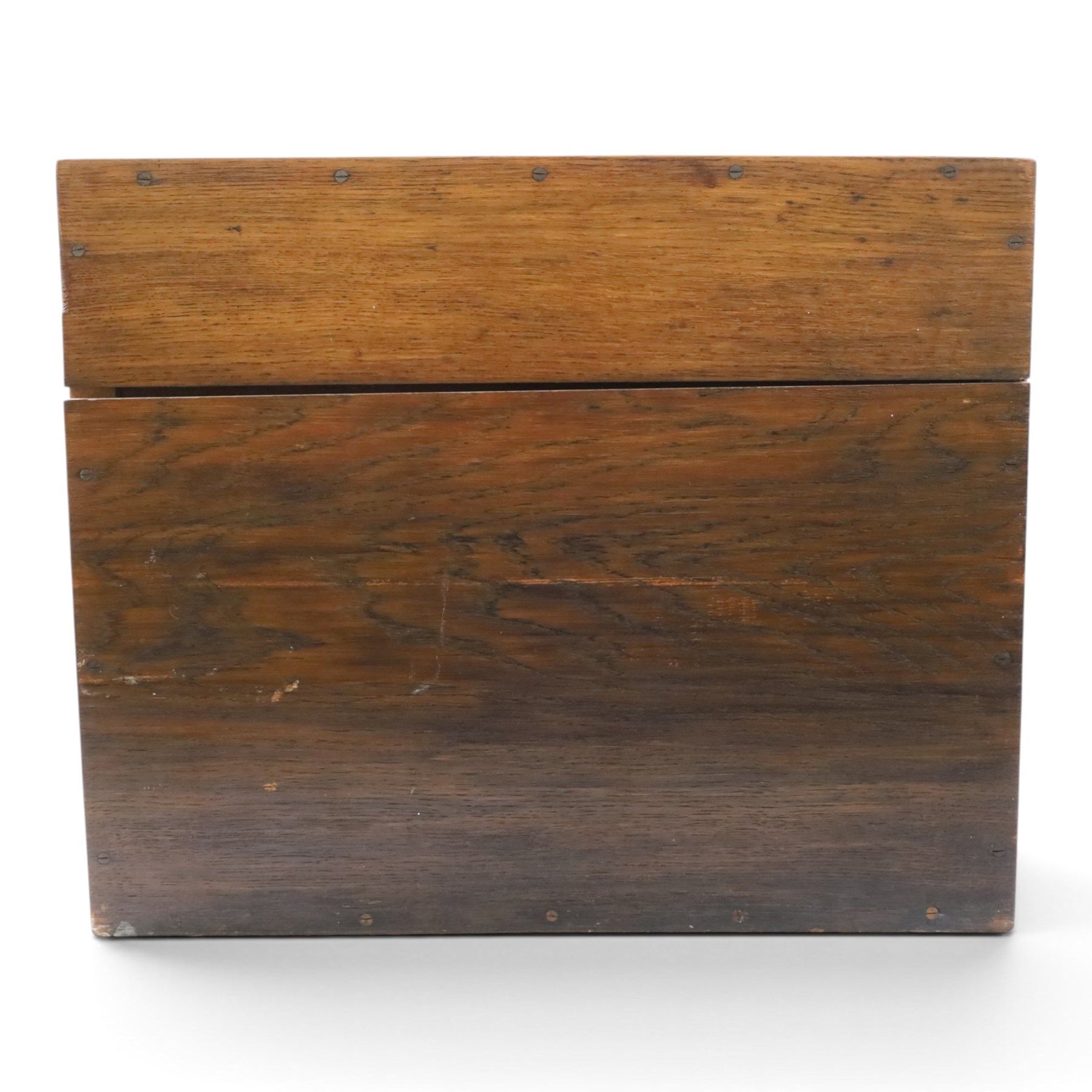 Ealy 20th century oak canteen, with five drawers behind double doors, four drawers containing a part set of silver plated Hanoverian pattern cutlery with engraved monograms and a set of twelve mother of pearl handled fruit knives and forks, the last drawer containing a collection of loose silver plated cutlery, canteen H39cm, W48cm