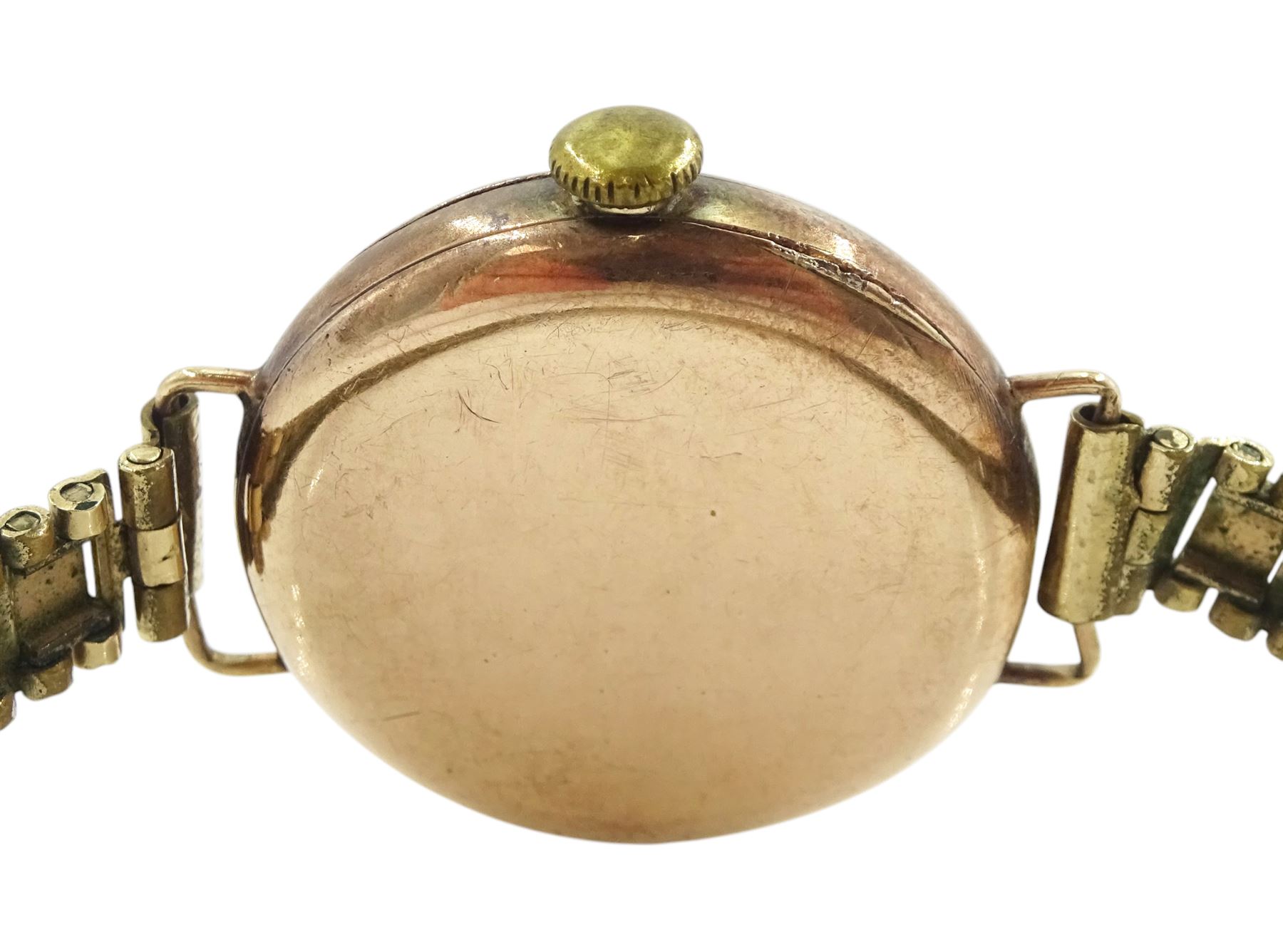Rolex early 20th century gentleman's 9ct gold manual wind wristwatch, white enamel dial with Roman numerals and subsidiary seconds dial, case No. 638495, London import mark 1915, on gilt strap