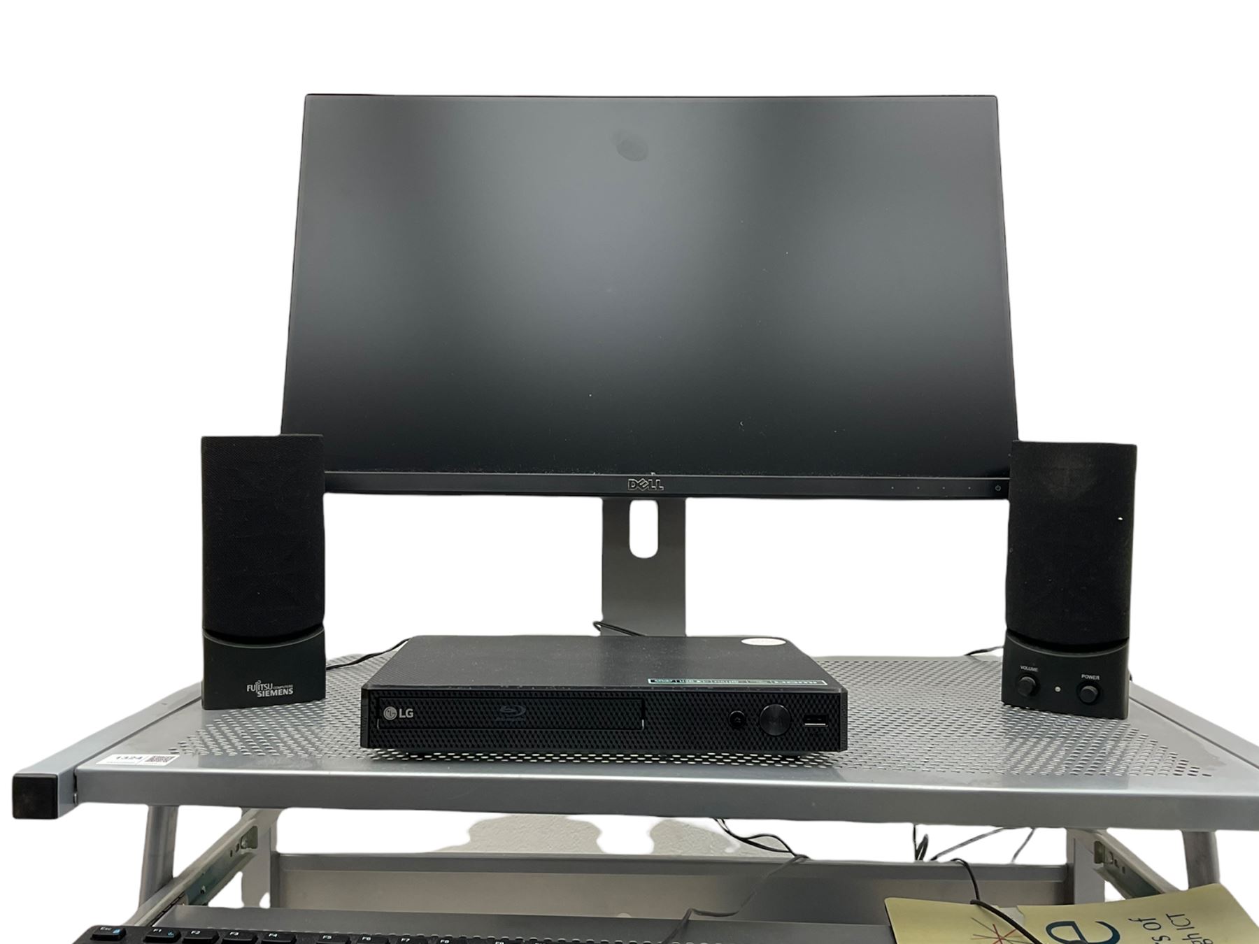 DELL i7 XPS 8900 series computer with monitor and various accessories including: LG BP250 Blu-ray player, SONY floppy disc drive etc. on stand