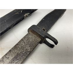 British No 7 MKI knife bayonet with 20cm single edged fullered clipped point blade;  blackened steel, large muzzle ring cross-guard; blackened swivelling pommel marked 'F5H'; red Tufnol composite grips; in blackened steel scabbard L33cm overall; British Pattern 1888 bayonet with scabbard; and German Ersatz bayonet with scabbard (3)
