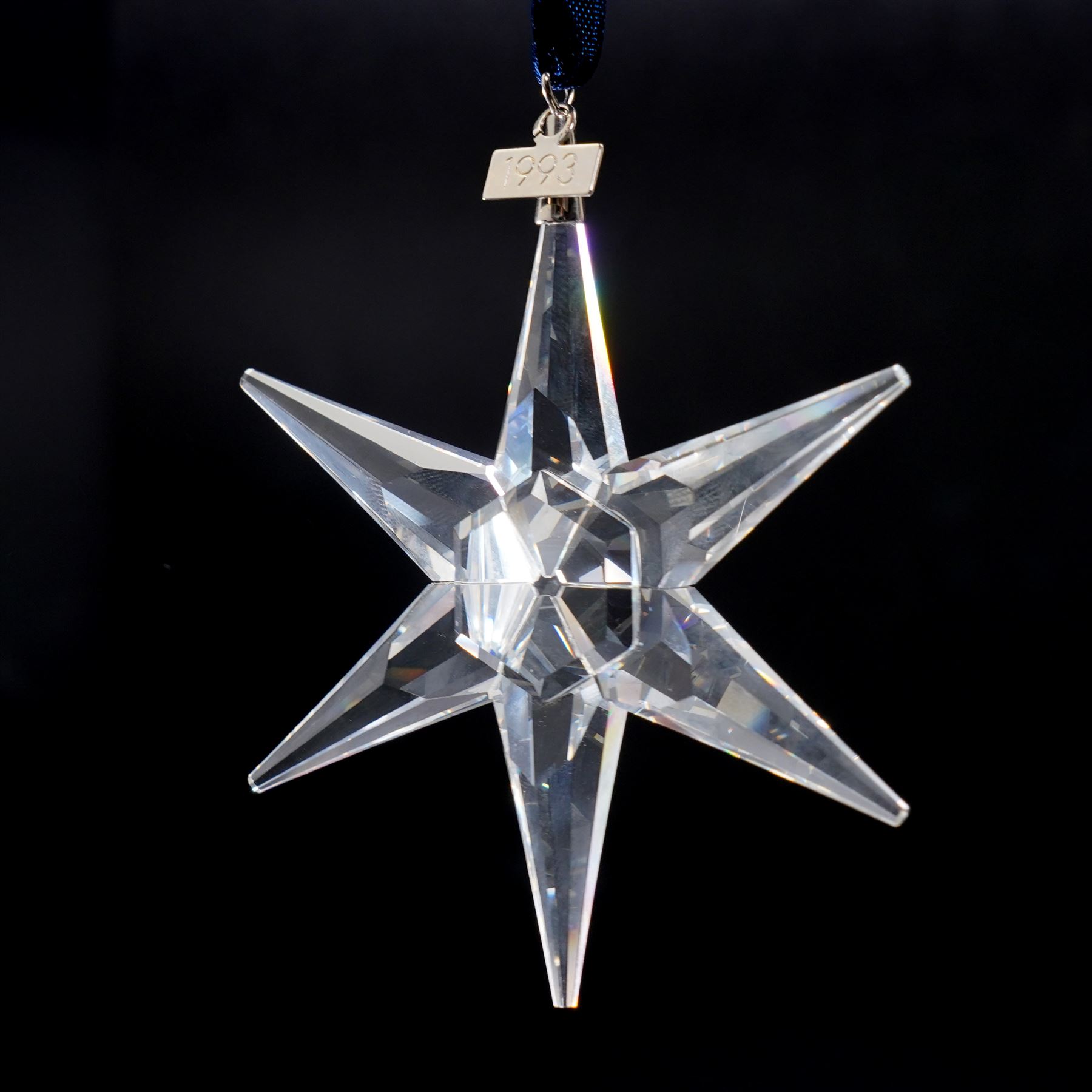 Eight Swarovski crystal snowflake Christmas ornaments, comprising years 1991-1998, some with certificates, boxed (8)