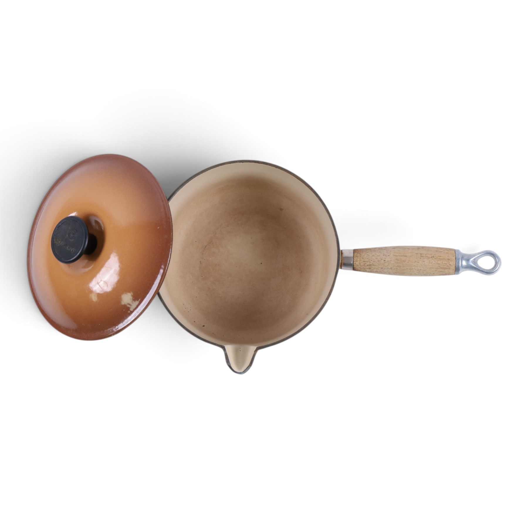 Set of three Le Creuset pans and lid