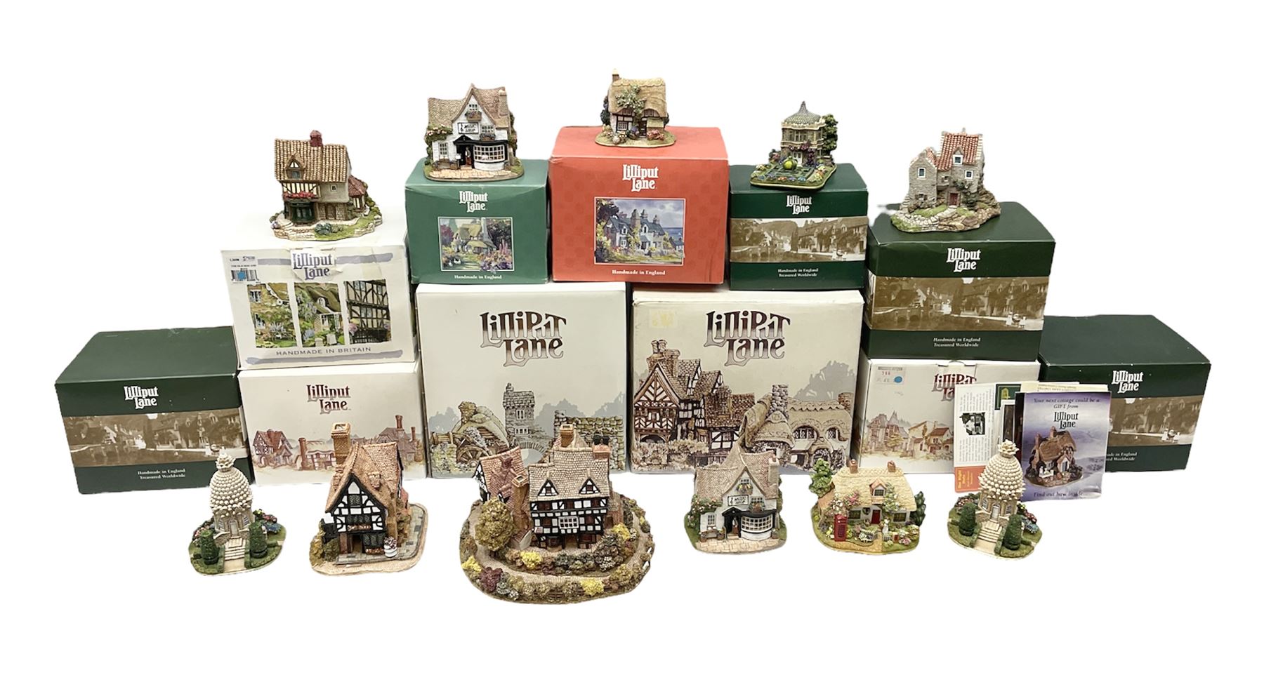 Eleven Lilliput Lane cottages from the British / English Collection, to include Tudor Court, Swan Inn, Culross House etc all boxed with deeds