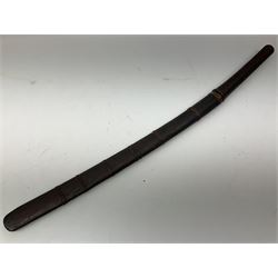 Burmese Dha type sword with 52cm plain steel slightly curving blade and plaited cane bound grip; in wooden scabbard with plaited cane bands L76.5cm overall