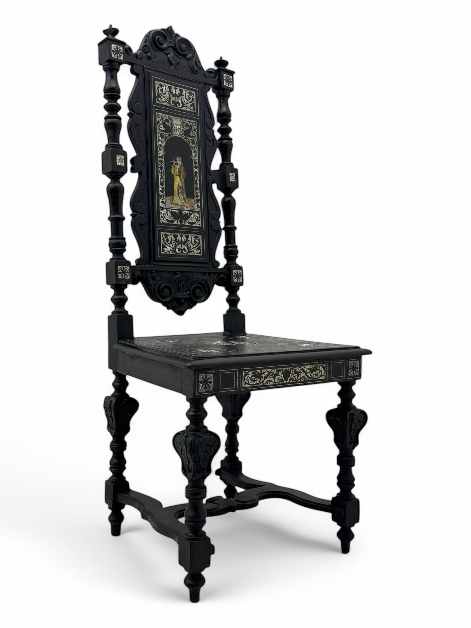 19th century Italian ebonised side chair, the backrest inlaid with bone and decorated with a painted figure in Renaissance dress within an arched reserve, flanked by turned supports and scrolled cresting, the seat and frieze similarly inlaid, raised on turned legs with shaped stretchers