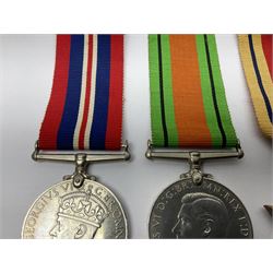 Group of five WWII medals comprising 1939-45 War Medal, Defence Medal and Italy, Africa and 1939-45 Stars; all with ribbons (5)
