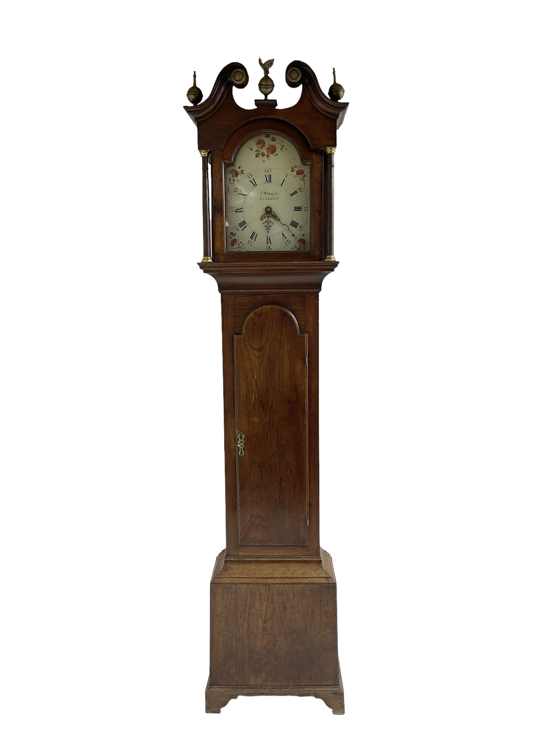 Thomas Wrangles -  early 19th-century oak longcase clock with a swans neck pendulum and three brass finials, glazed hood door flanked by two free standing pilasters, long trunk door with a break-arch top on a square plinth raised on bracket feet, painted dial inscribed T Wrangles Scarboro, dial pinned directly to a 30-hour chain driven count wheel movement striking the hours on a bell.
 With pendulum and weight. 