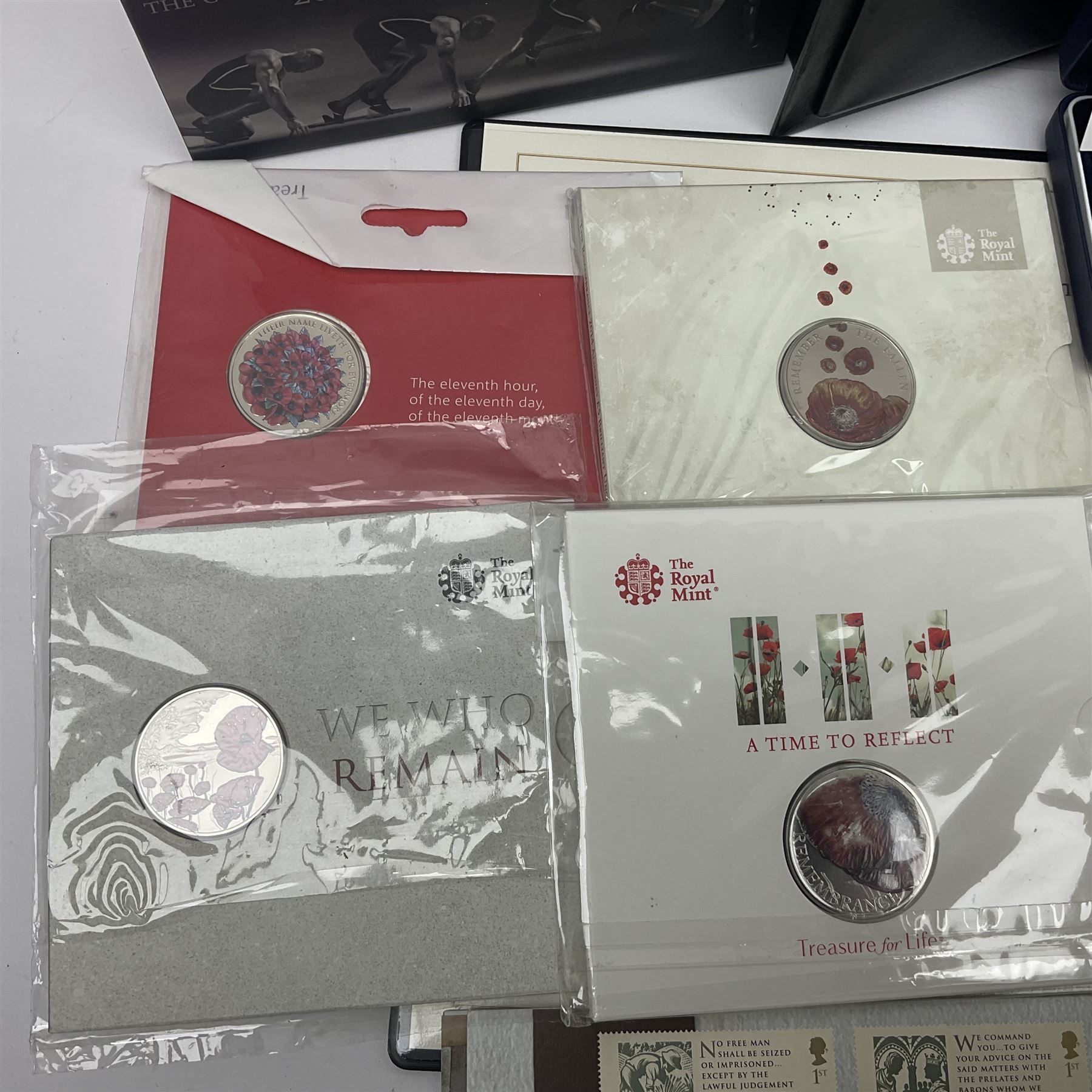 Mostly commemorative coinage, including various Queen Elizabeth II United Kingdom brilliant uncirculated fifty pence, two pound and five pound coins in card folders, The Royal Mint United Kingdom 2012 proof coin set, Alderney 2021 'Royal National Lifeboat Institution' five pound coin cover in Harrington and Byrne folder etc
