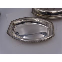 Pair of 1930s silver serving dishes with covers, each with removable handles, hallmarked Barker Brothers Silver Ltd, Birmingham 1935, L27.5cm, H12cm