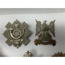 Fifteen Scottish Glengarry and other metal military badges including Argyll & Sutherland, Royal Glasgow Yeomanry, Cameronians, Lanarkshire Yeomanry, Kings Scottish Own Borderers, Highland Light Infantry, Border Regiment, Lowland Regiment, Lothians & Border Horse Yeomanry, Ayrshire Earl of Carricks Own Yeomanry etc