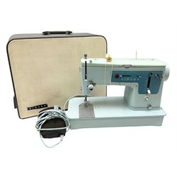 1960s model 347 Singer sewing machine, in baby blue colourway with pedal and original case