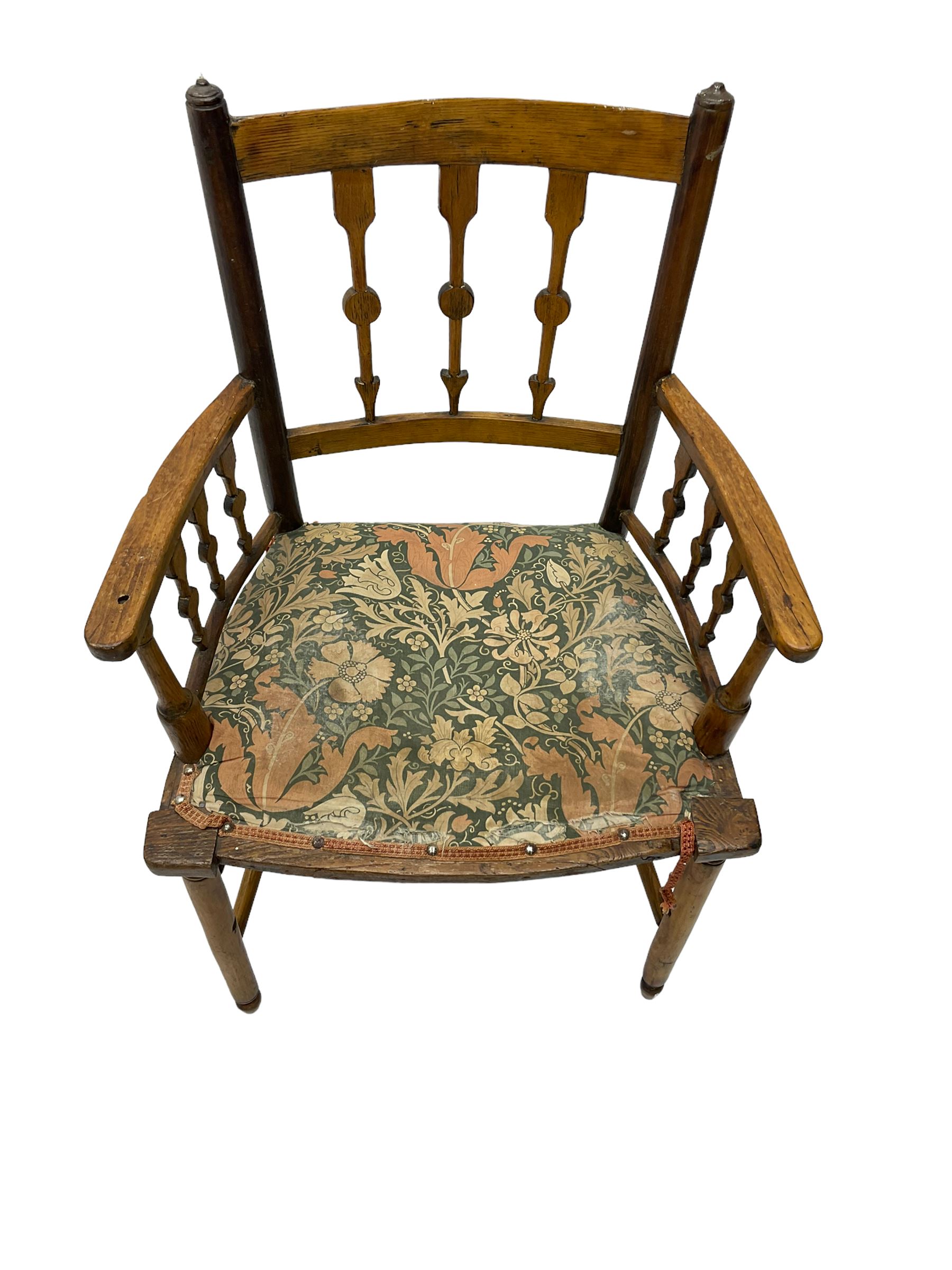19th century ash and beech Sussex type elbow chair, the back and arms with arrow shaped vertical rails, upholstered seat, on turned supports