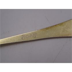 Collection of Norwegian silver flatware, including a set of six silver-gilt demitasse spoons, by David Andersen, stamped D-A 830s and a serving spoon, the pierced terminal with two doves, engraved with initial K and dated 10.09.32 verso, stamped 830s, etc