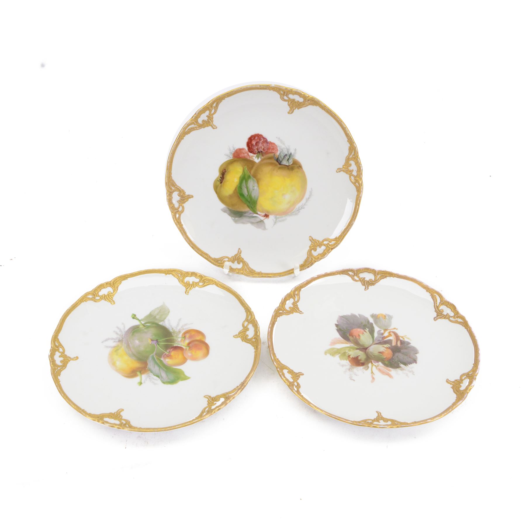 Three early 20th century Berlin KPM hand painted porcelain cabinet plates, each or circular form with tooled gilt detailed rim, and hand painted fruit still life to centre, with painted and printed marks beneath, D19cm