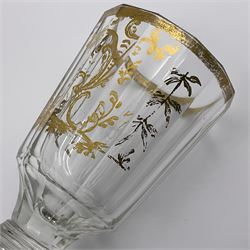 Three 18th century wine glasses comprising a plain stemmed glass with bell shaped bowl and conical folded foot H16cm, another plain stemmed glass with ogee bowl and folded foot and a Continental glass with gilt faceted bowl, decorated with male figure within a landscape, on a clear Silesian seven sided cut stem (3)