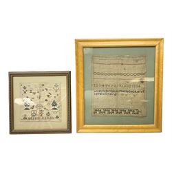 Two 19th century needlework samplers by Ann Kirby, comprising an example worked with birds, trees and floral motifs and another larger example worked with the alphabet and numbers above scrolling floral edge, 25th July 1816 aged fourteen years, both glazed and framed, largest H46.5cm W42.5cm