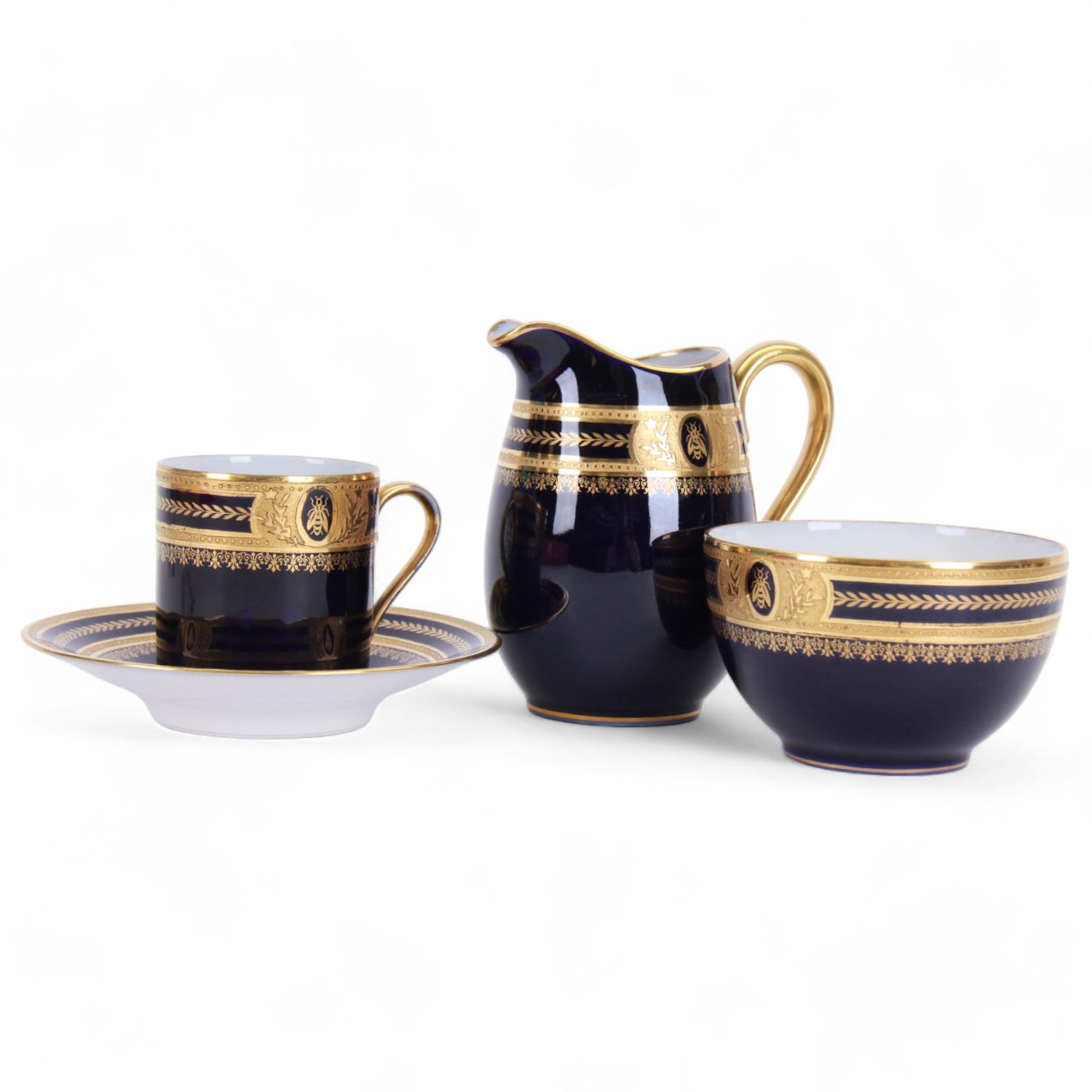Limoges Coffee can and saucer, jug and open sucrier, all decorated with gilt boarder and decorated with bees framed with laurel leaves, with makers mark beneath