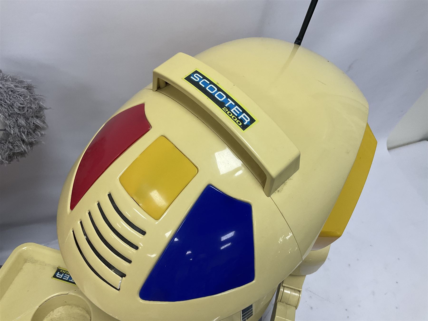 Scooter 2000 plastic battery operated remote control waiter robot with tray and remote control unit; together with a large 'Me To You' floor standing teddy bear (2)