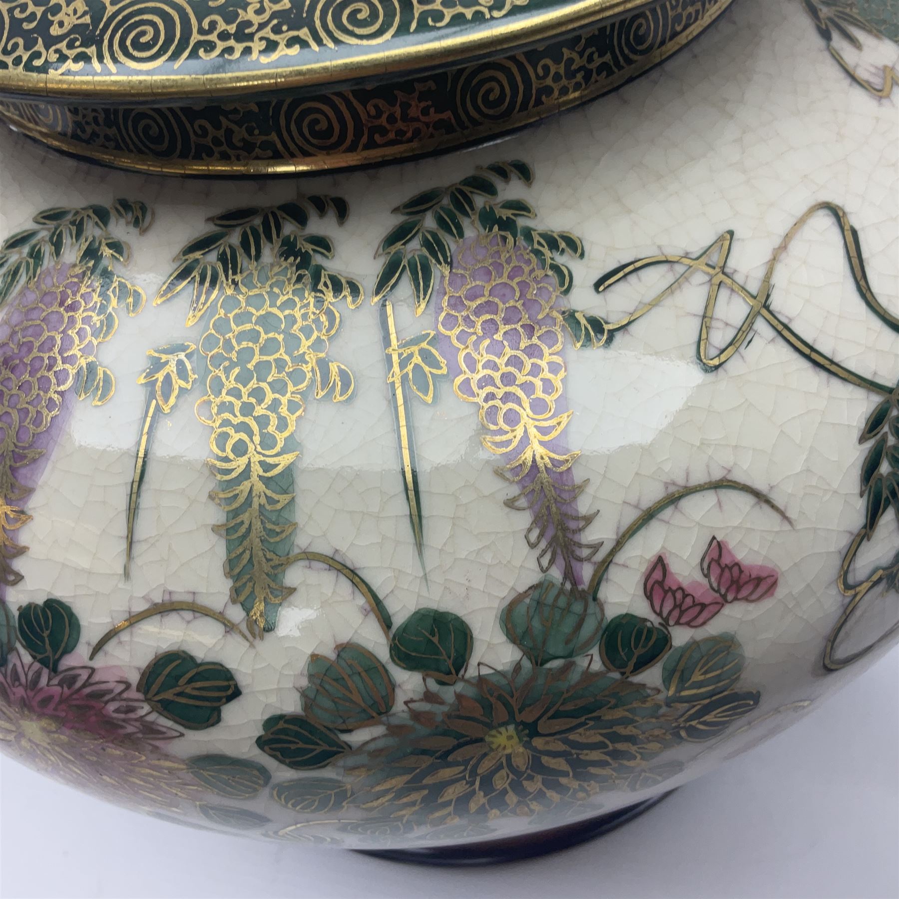 Table lamp of squat baluster form, decorated with Mandarin ducks and floral  landscape, upon a circular wooden base H42cm