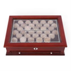 Thirty-two United States of America silver one dollar coins, comprising twenty-three 'Morg...