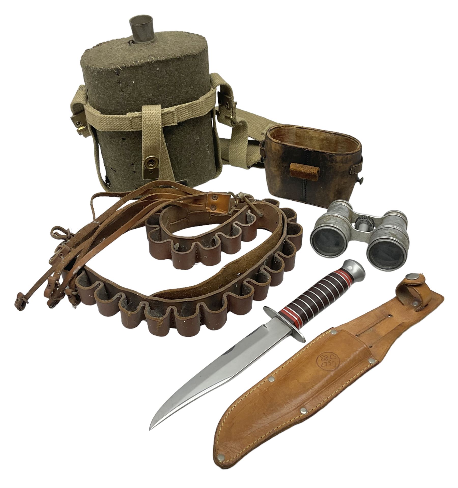 Mundial Brazil bowie knife, the 15.5cm steel blade inscribed 'Sheriff Knife', with banded and aluminium hilt; in leather sheath L29cm overall; British Army felt covered metal water bottle with webbing strap; leather 12-bore cartridge belt; and small pair of non-military binoculars in part case (4)