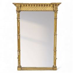 Late 19th century giltwood pier mirror, the rectangular mirror plate enclosed by a moulded...