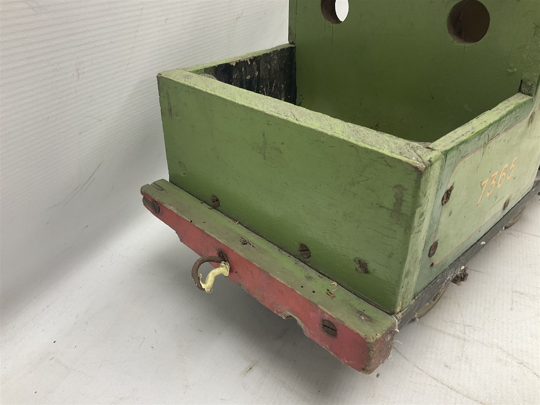 1960s scratch-built green, black and red painted wooden model of a 4-6-0 tank locomotive 'Andrew' No.7365 L88cm; and an unused wall mounting die-cast model display cabinet with glass door and shelves 52 x 40cm (2)