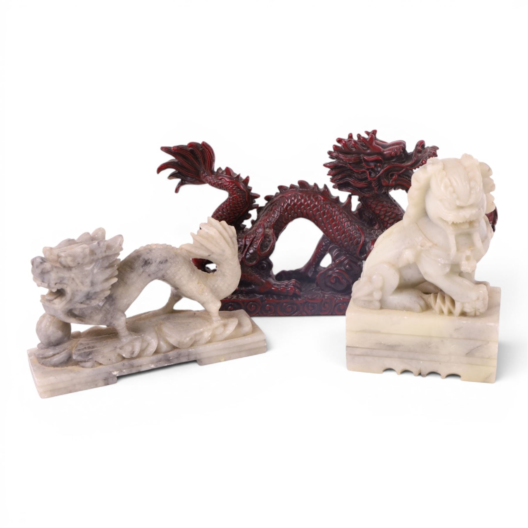 Carved hardstone figure of running horses, together with pair of soapstone foo dogs, and similar 