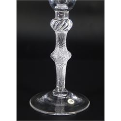 Mid 18th century wine glass, the funnel bowl engraved with fruiting vines upon a single series air twist double knopped stem and conical foot, H16.5cm