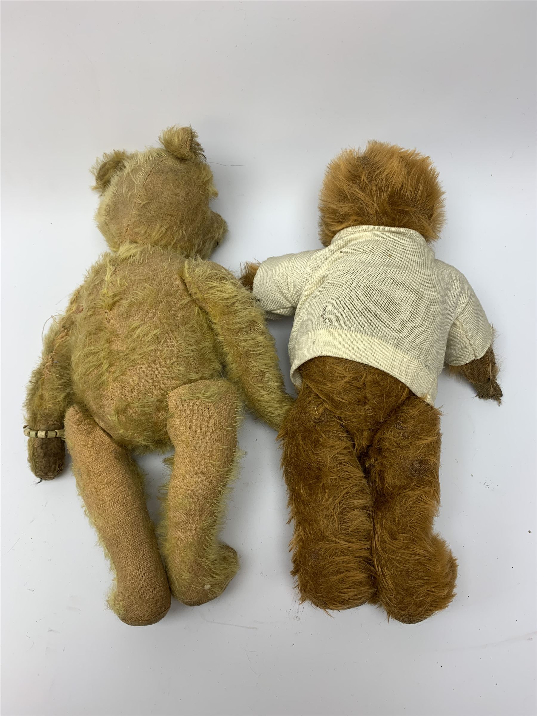 Early 20th century cinnamon coloured bear c1920, possibly continental, with unusual hedgehog styled head/face, swivel jointed head, wood wool filled body with jointed limbs, five claw stitches to feet  and inoperative growler mechanism H16