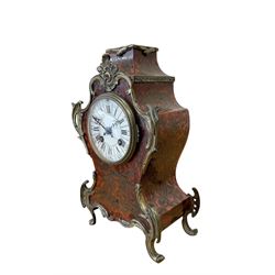 French- late 19th century 8-day Boulle mantle clock with rococo brass mounts, enamel dial with segmented Roman numerals, five-minute Arabic's and matching steel hands, Parisian rack striking movement sounding the hours and half hours on a bell. With pendulum and key. 