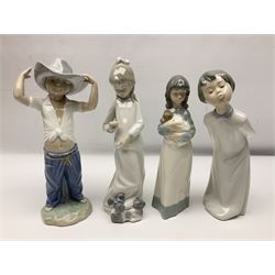 Eleven Nao figures to include Cowboy, Girl with Puppy, Clown, Girl in hat etc 