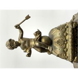 18th/19th century French Rococo Boulle bracket clock, the cartouche shaped case with putto pediment over shaped glazed door, ornate moulded circular dial set with enamel Roman panels, overall the case decorated with inlaid pierced brass work and foliate scrolling mounts and masks, single train driven movement striking on three bells with pull repeater, movement with shaped front and back plates with four tapering conical pillars, inscribed 'Brodon A Paris'