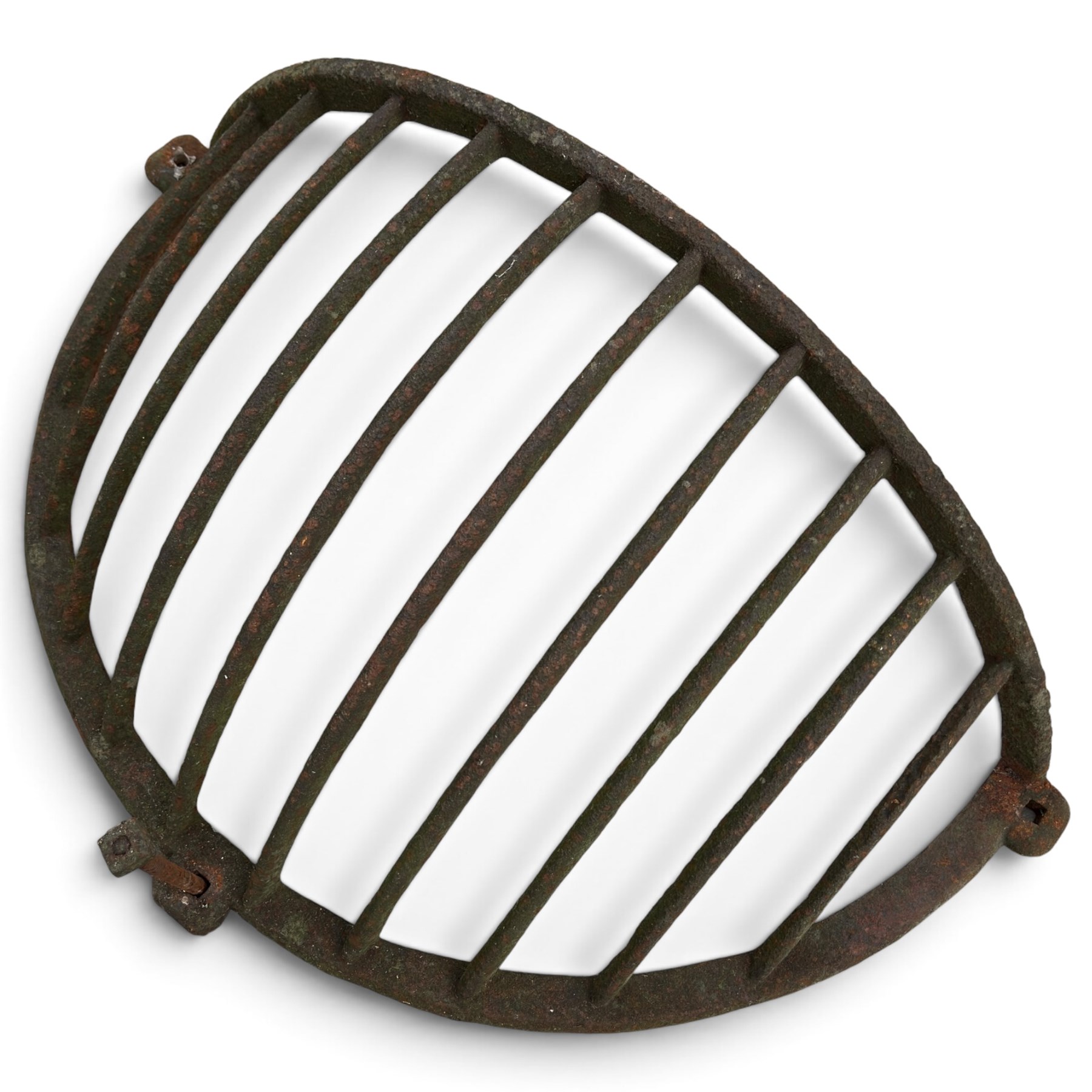 Victorian wrought iron wall-mounted stable hay rack of bowed cage form, with curved bars and fixing lugs