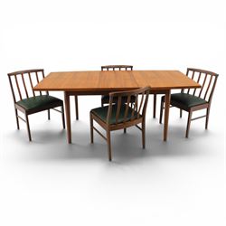 Mid-20th century teak dining table and chairs, with stowable fold over leaf, raised on squ...