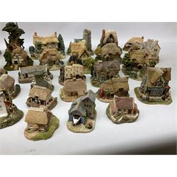 Forty six Lilliput Lane model cottages, to include 'Convent in the Woods', 'Holme Dyke' 'Secret Garden' etc