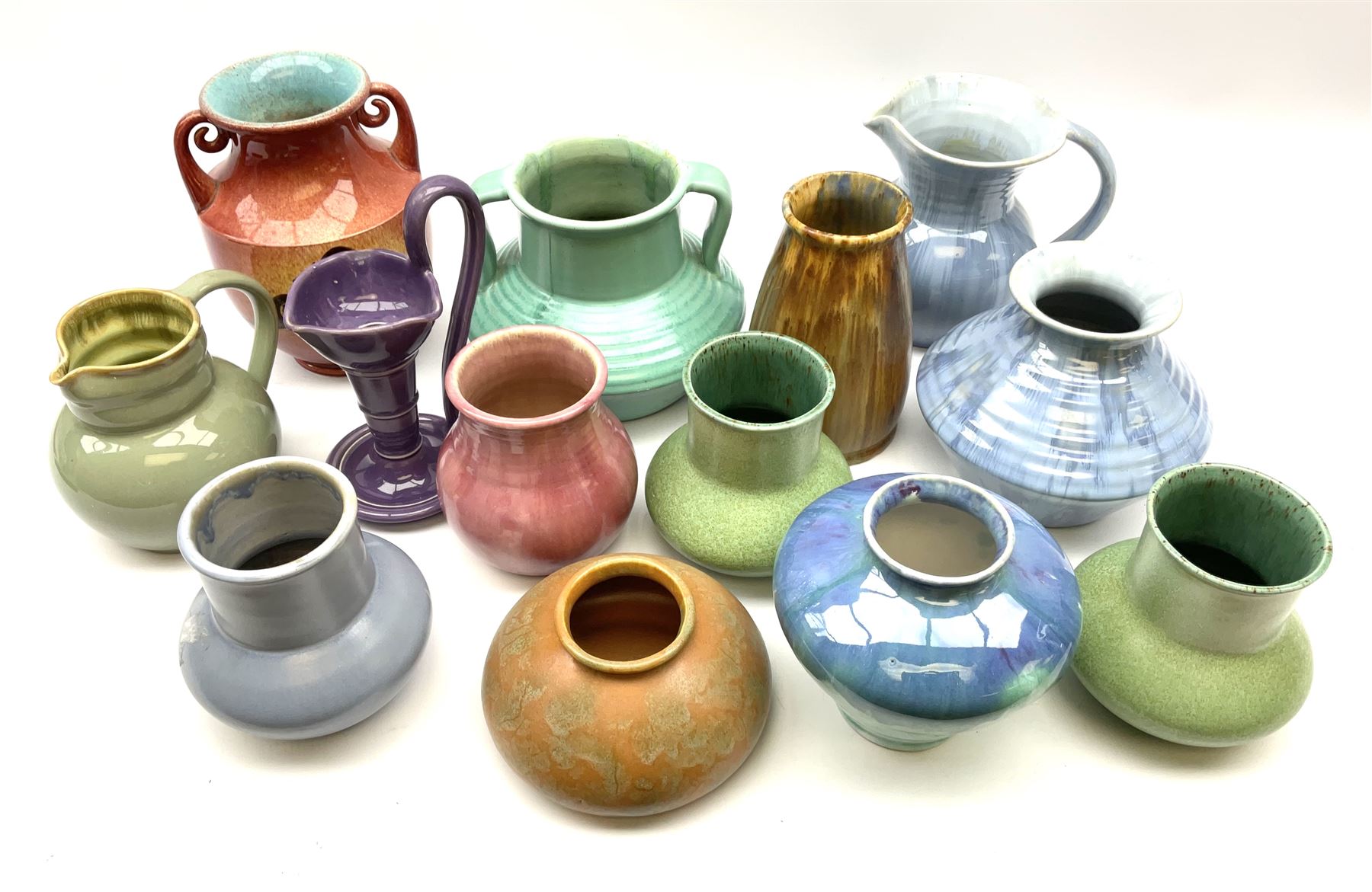 A group of Candy Ware vases, of various form and design with varied