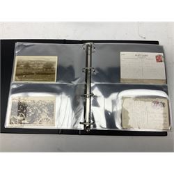 Three modern loose leaf albums containing over two-hundred and thirty war and military related postcards and ephemera including battlefield and trench views, Kings front visit, marching soldiers, propaganda images, interesting postmarks, War Bond campaign cards etc