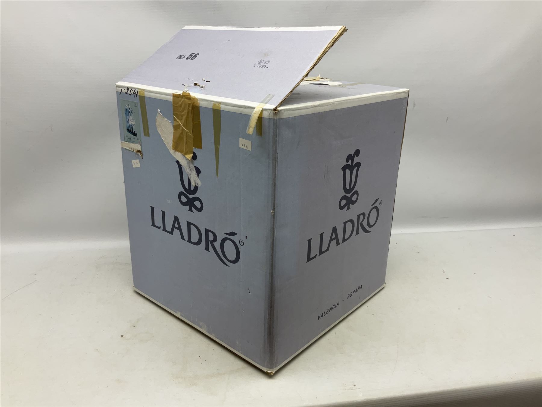 Lladro figure, Jester Serenade, modelled as a ballerina with bouquet of flowers seated before a jester playing the violin, limited edition 2541/3000, sculpted by Antonio Ramos, no 5932, with original box, year issued 1993, year retired 1994, H37cm