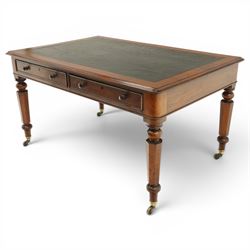 Mid Victorian four drawer mahogany partners' writing table, with leather inset top with moulded edge, with two frieze drawers to either side, on turned supports terminating in castors