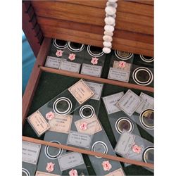 Victorian collector's specimen cabinet, containing a number of prepared microscope slides including miniature photographs, animal and human pathological, physiological and histological specimens and botanical specimens, mostly annotated in ink, the cabinet with glazed door, the drawers with bone handles and lined with green felt, owned by Dr Arthur Bristow, together with a picture of the doctor, cabinet H43cm