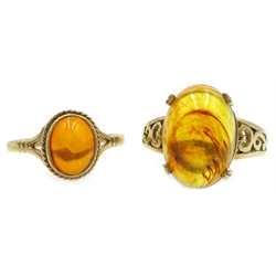 Two 9ct gold Baltic amber rings hallmarked