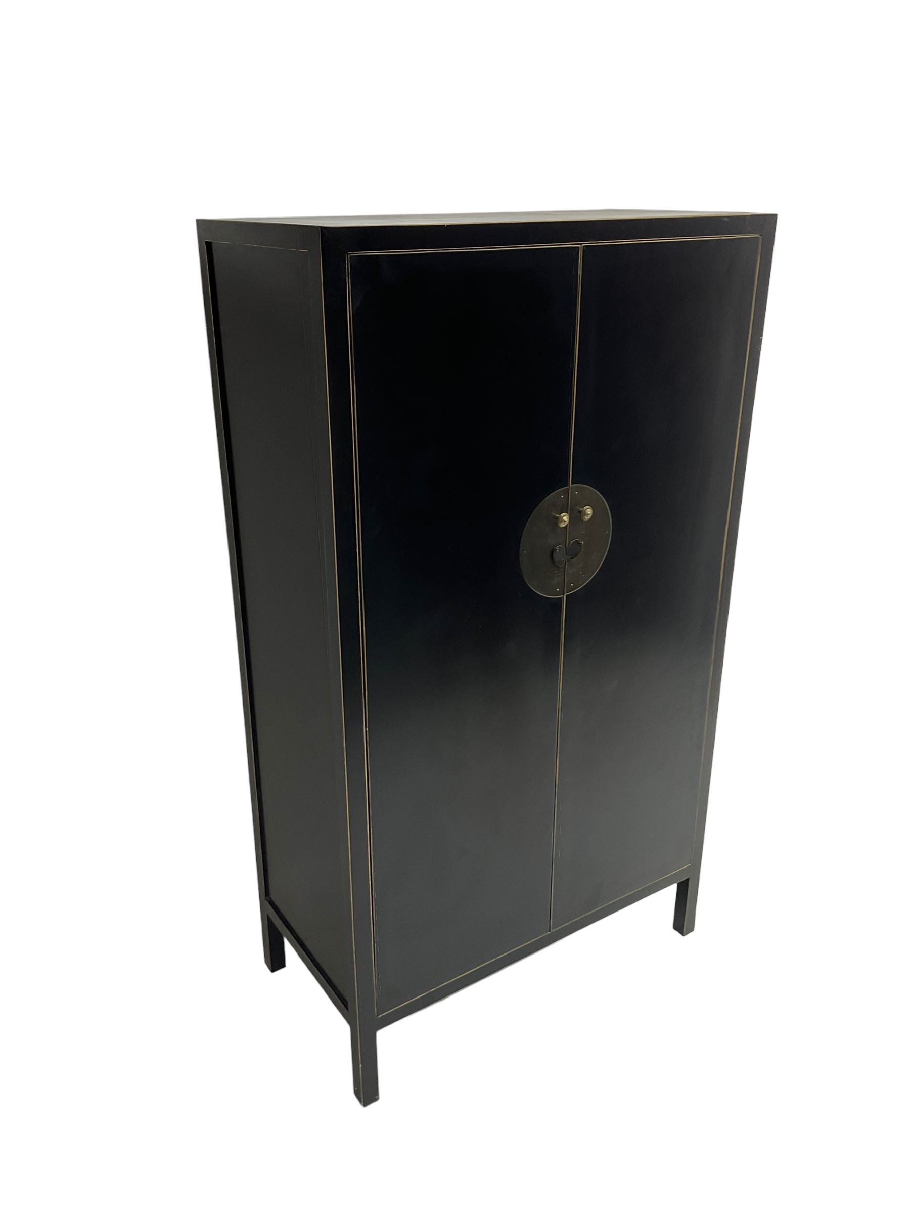 Chinese design black lacquered wardrobe, two cupboard doors enclosing hanging rail and two drawers