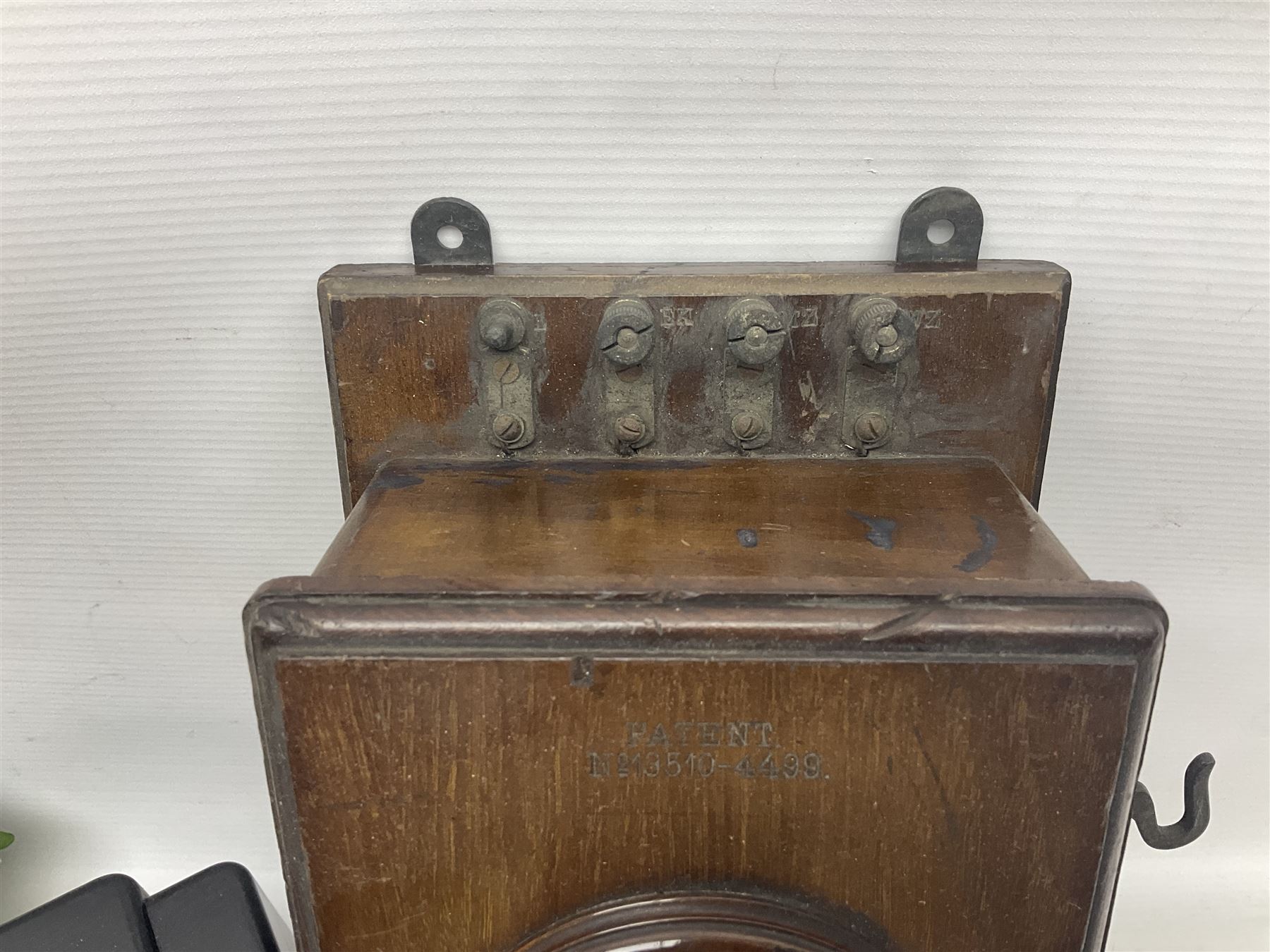 Collection of phone headsets, including GPO bakelite examples, together with other telephone parts 