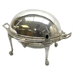 William Hutton & Sons silver plated entree dish, of oval form with twin handles, the revolving top with engraved monogram, upon four claw and ball feet, H22cm 