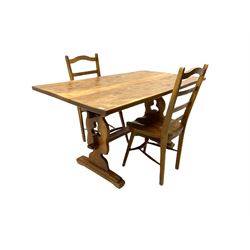 Yorkshire walnut Squirrelman rectangular table, trestle and stretcher base, and two chairs