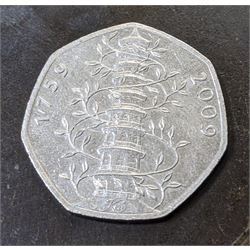 Queen Elizabeth II United Kingdom fifty pence twenty-six coin collection, including 2009 Kew Gardens, 2011 World Wildlife Fund, 2014 Commonwealth Games, 2016 Beatrix Potter etc, housed in official The Royal Mint coin hunt folder